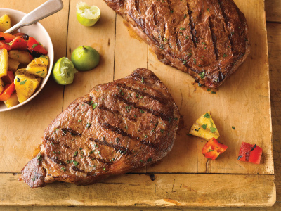 Caribbean Ribeye Steaks with Grilled Pineapple Salad